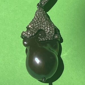 Large black pearl and diamond pendant